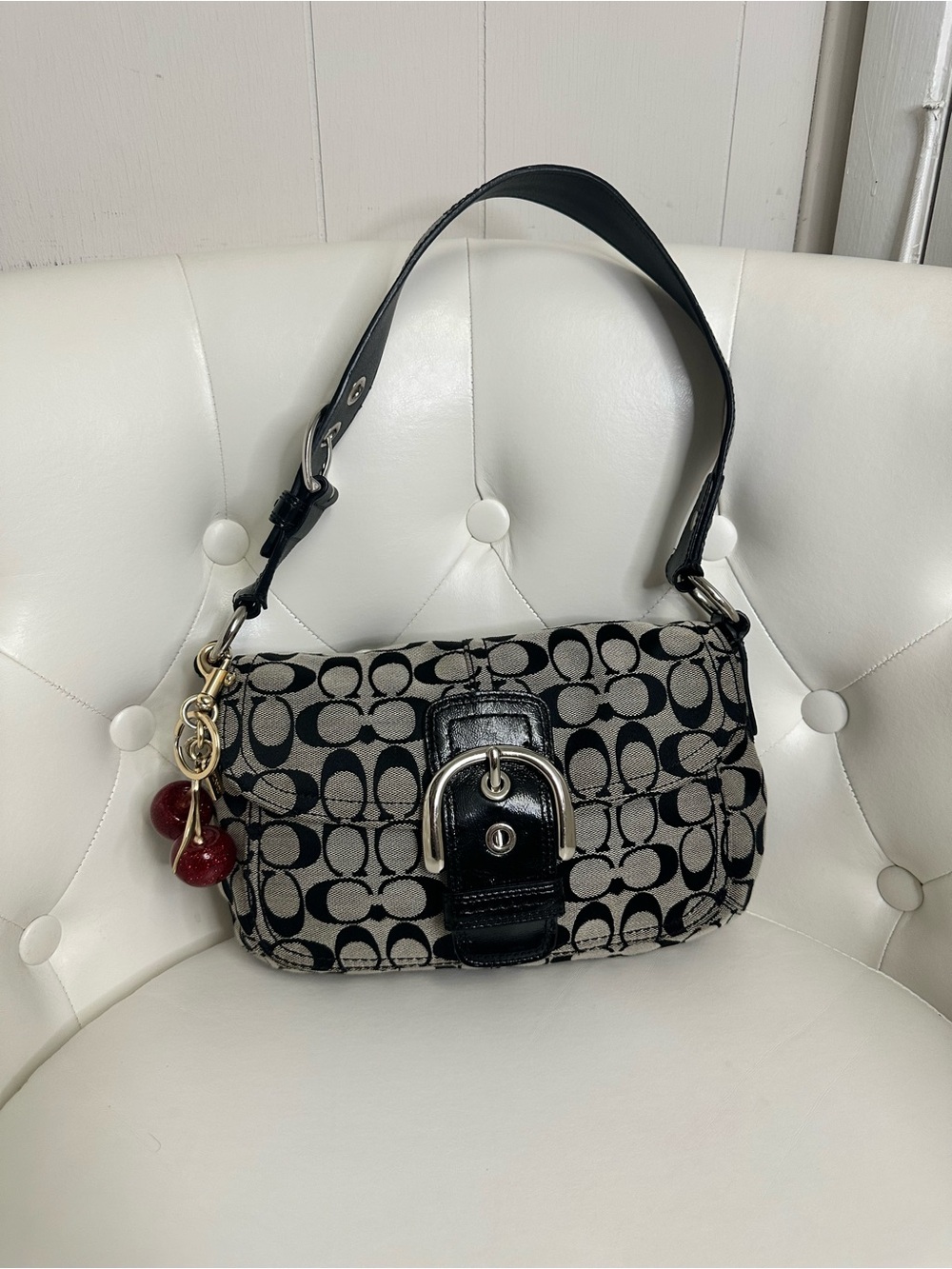 Black and grey coach SoHo